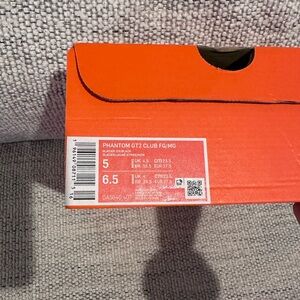 Nike Phantom GT2 Club FG/MG in Light Blue, Black & Yellow